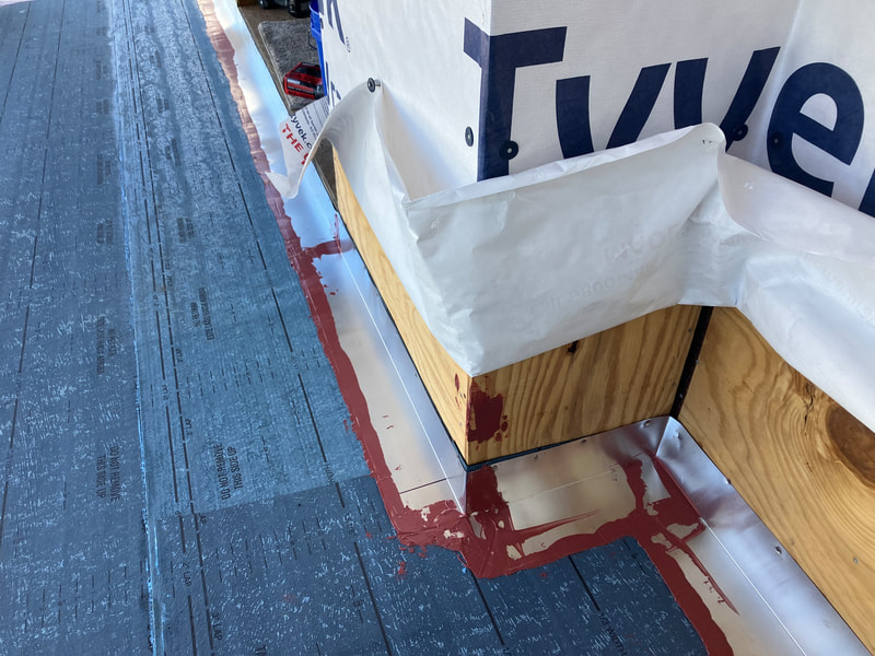 Waterproof coating work in progress on the Neptune Beach residential deck